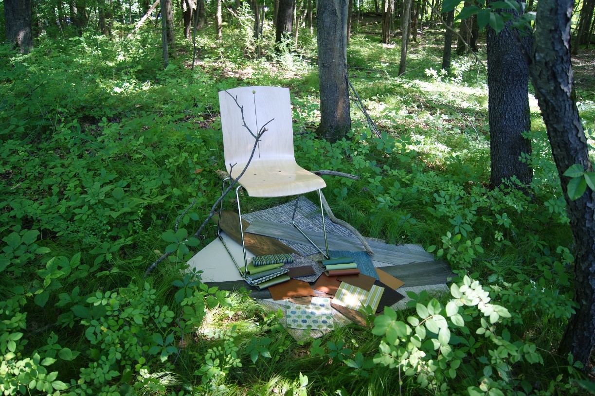 Chair with flooring samples in the woods